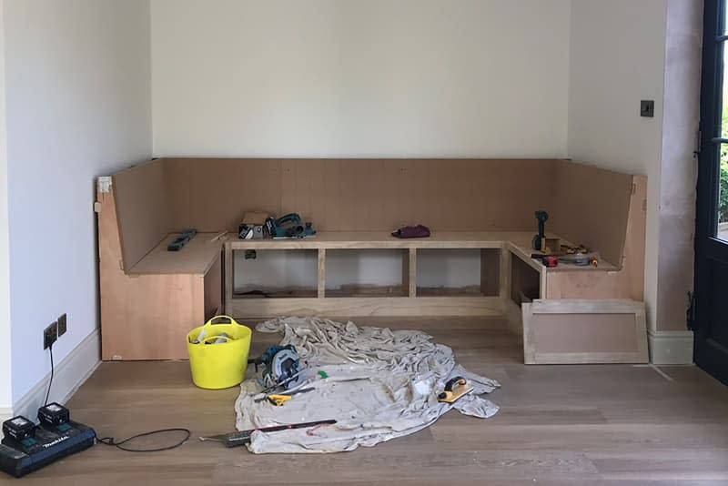 Banquette being built in breakfast nook.