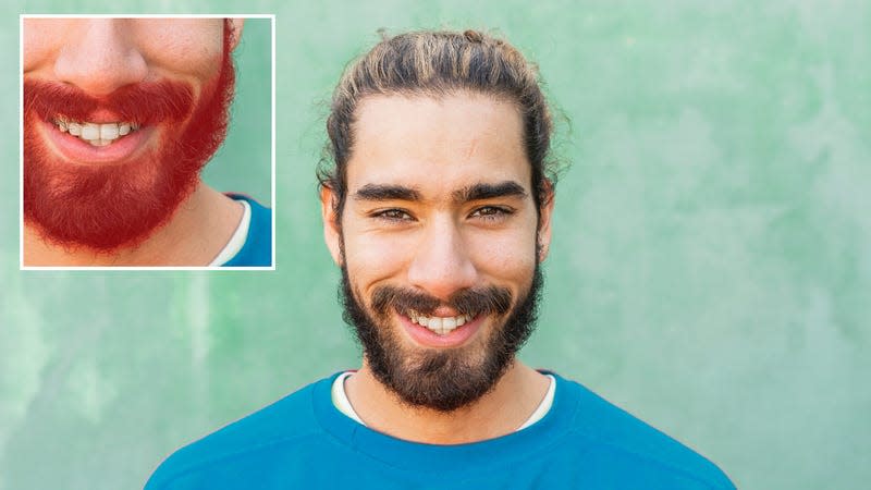 A portrait of a person with a beard showing the automatically generated mask applied to it in Adobe Lightroom.