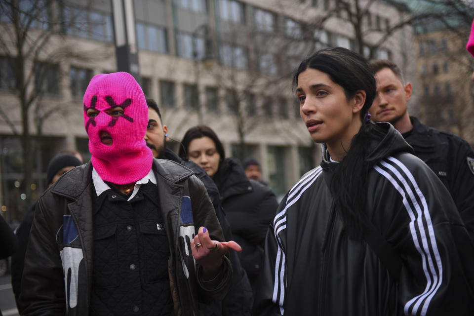 In this photo provide by protest group Pussy Riot on Sunday, Feb. 18, 2024, Nadya Tolokonnikova, right, member of Pussy Riot and former prisoner in Russia attends a demonstration outside of the Russian Embassy in relation to the death of Russian Opposition leader Alexei Navalny, in Berlin. The sudden death of Navalny, 47, was a crushing blow to many Russians, who had pinned their hopes for the future on President Vladimir Putin's fiercest foe. Navalny remained vocal in his unrelenting criticism of the Kremlin even after surviving a nerve agent poisoning and receiving multiple prison terms. (Pussy Riot/Nadya Tolokonnikova via AP)