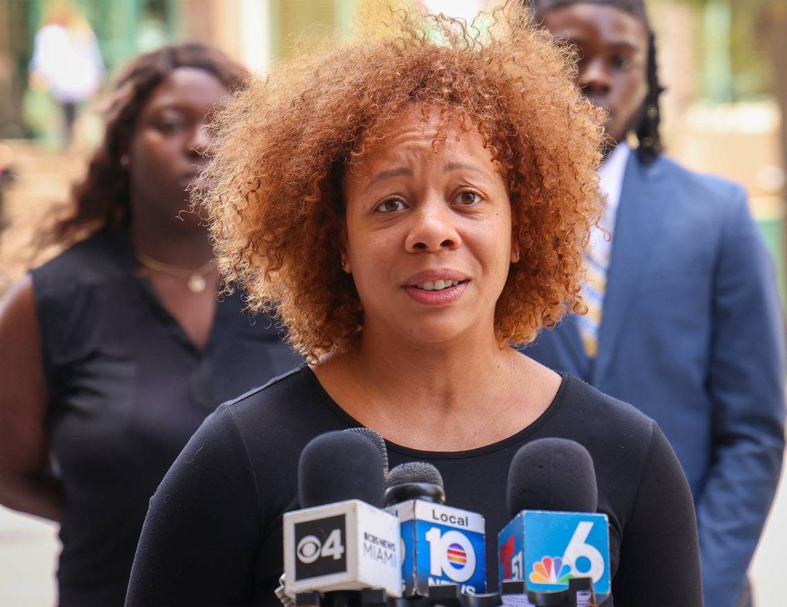 LaToya Ratlieff, center, speaks to the media during a press conference as attorneys announced lawsuit filed by her and others against Fort Lauderdale Police Department for the violent response to peaceful protestors at the May 31, 2020, George Floyd protest on Monday, June 3, 2024, in Fort Lauderdale, Florida.