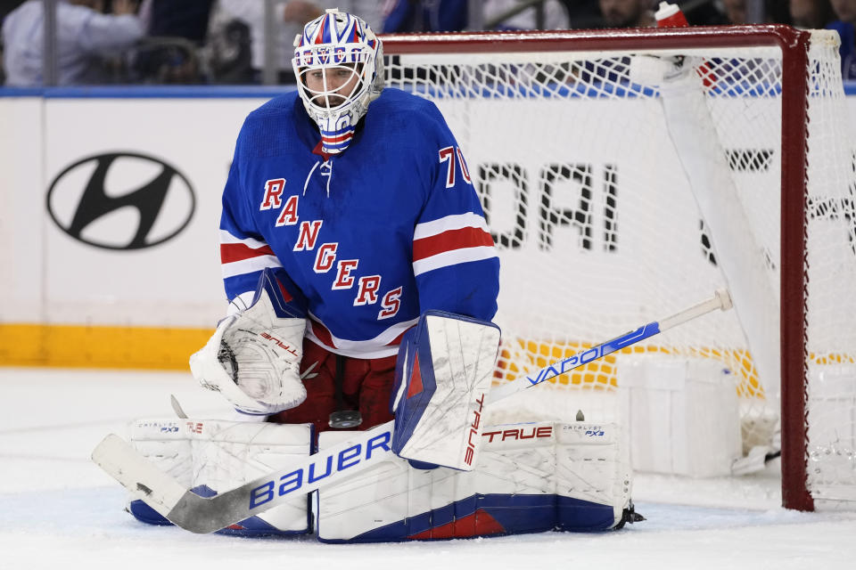 New York Rangers goaltender Louis Domingue stops a shot on goal during the second period of an NHL hockey game against the Minnesota Wild Thursday, Nov. 9, 2023, in New York. (AP Photo/Frank Franklin II)