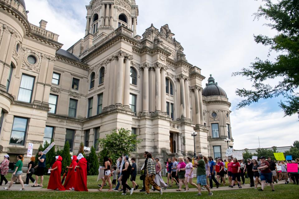 An impromptu protest against the Supreme Court’s overturning of Roe v. Wade begins as a march from the Old Courthouse to the federal courthouse in Evansville, Ind., Friday evening, June 24, 2022.