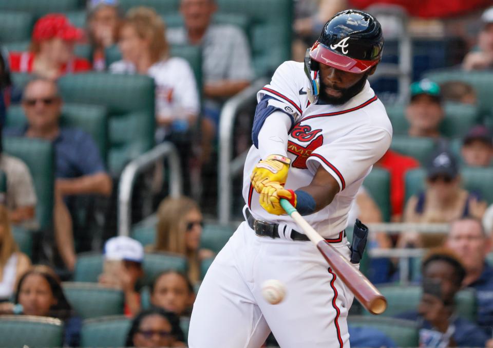 FILE - Atlanta Braves' Michael Harris II, making his major-league debut, hits his first major league hit, a single in the sixth inning of a baseball game against the Miami Marlins, on May 28, 2022, in Atlanta. Harris II — whose call up last year propelled the Braves to 101 wins and a division title — said Saturday he “had an all right season, I guess” and then responded with more modesty when asked if that's really how he feels about 2022. (AP Photo/Bob Andres, FIle)