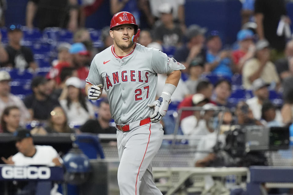 Los Angeles Angels' Mike Trout (27) looks to center field after hitting a home run during the fourth inning of a baseball game against the Miami Marlins, Monday, April 1, 2024, in Miami. (AP Photo/Marta Lavandier)