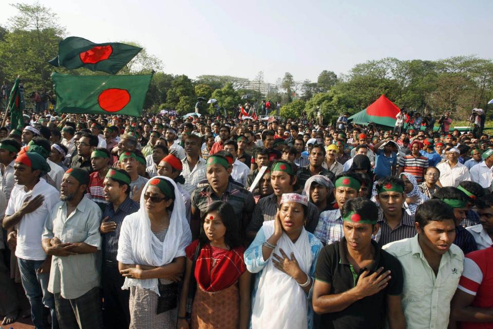 <span class="caption">Moderate activists in Bangladesh protesting at a Dhaka intersection demanding harsh punishment for those accused of crimes during the 1971 independence war from Pakistan.</span> <span class="attribution"><a class="link " href="http://www.apimages.com/metadata/Index/Bangladesh-War-Crimes/213aca2908054060ac664c39187d5a6f/16/0" rel="nofollow noopener" target="_blank" data-ylk="slk:AP Photo/Pavel Rahman;elm:context_link;itc:0;sec:content-canvas">AP Photo/Pavel Rahman</a></span>