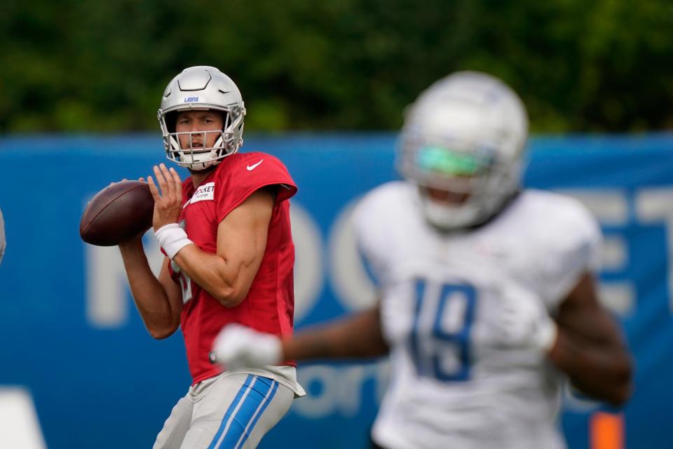 Detroit Lions quarterback Matthew Stafford throws to receiver Kenny Golladay during a drill at training camp Saturday, Aug. 29, 2020, in Allen Park.