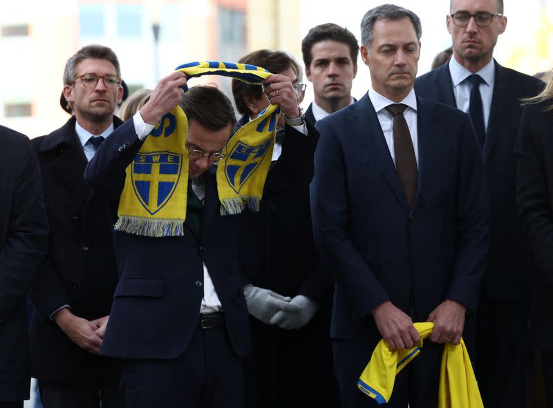 Swedish PM Kristersson and Belgian PM De Croo pay tribute to the victims of the shooting in Brussels