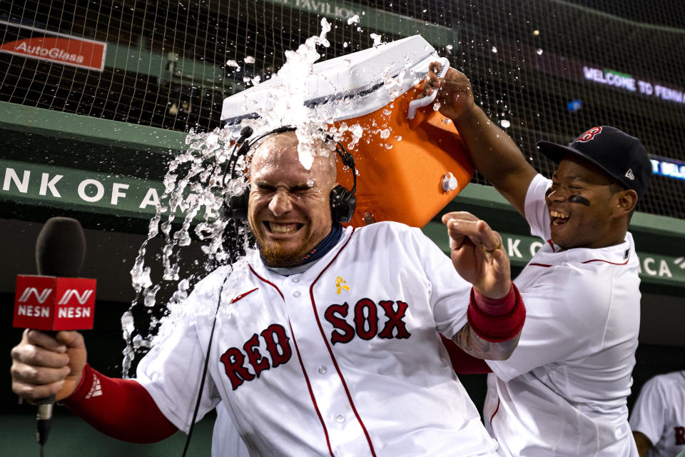 BOSTON, MA - SEPTEMBER 5: Christian Vazquez #7 of the Boston Red Sox is doused with Gatorade after scoring the game winning run on a walk-off infield single by Yairo Munoz #60 of the Boston Red Sox during the ninth inning of a game against the Toronto Blue Jays on September 5, 2020 at Fenway Park in Boston, Massachusetts. The 2020 season had been postponed since March due to the COVID-19 pandemic. (Photo by Billie Weiss/Boston Red Sox/Getty Images)