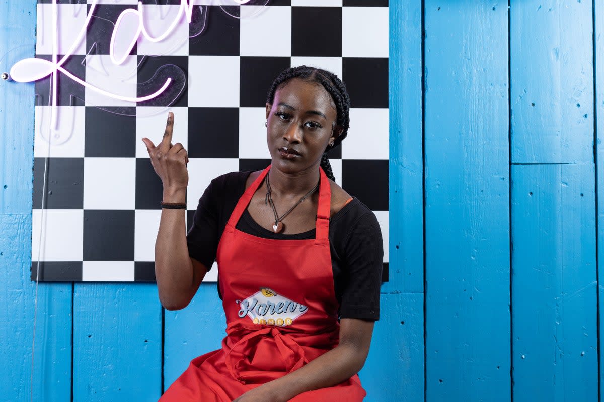  The bird’s the word: waitress Ebony Cameron gets in the spirit of Karen’s  (Daniel Hambury/Stella Pictures Ltd)