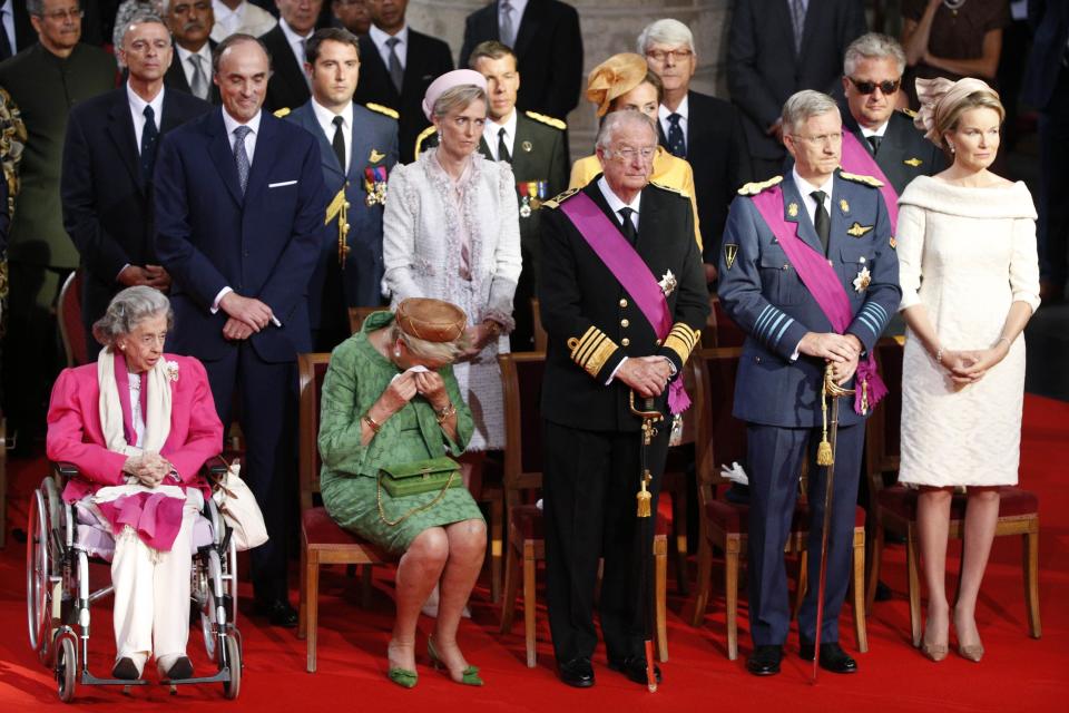 RNPS - PICTURES OF THE YEAR 2013 - Belgium's royal family Queen Fabiola, Queen Paola, King Albert II, Crown Prince Philippe and Crown Princess Mathilde (front row, L-R) attend a Te Deum mass celebrating the 20th anniversary of the reign of Belgium's King Albert II, the Belgian National Day, King Albert's abdication and the inauguration of his successor King Philippe, at St Gudule Cathedral in Brussels July 21, 2013. Prince Lorenz, Princess Astrid, Princess Claire and Prince Laurent (L-R) stand behind. REUTERS/Kevin Coombs (BELGIUM - Tags: ENTERTAINMENT ROYALS RELIGION TPX)