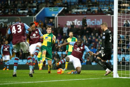 Football Soccer - Aston Villa v Norwich City - Barclays Premier League - Villa Park - 6/2/16 Norwich City's Patrick Bamford in action with Aston Villa's Jores Okore, Joleon Lescott and Mark Bunn Action Images via Reuters / John Sibley Livepic