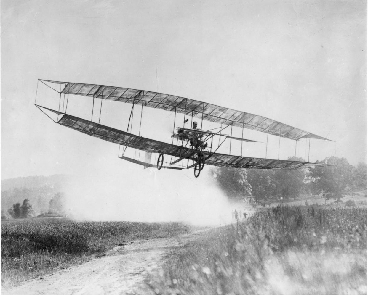 Glenn Curtiss flies in Hammondsport on the Fourth of July in 1908.