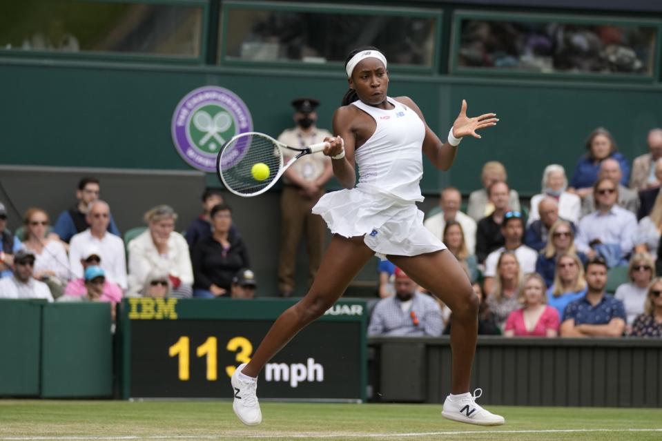 Coco Gauff plays a return to Angelique Kerber during the fourth round at Wimbledon.