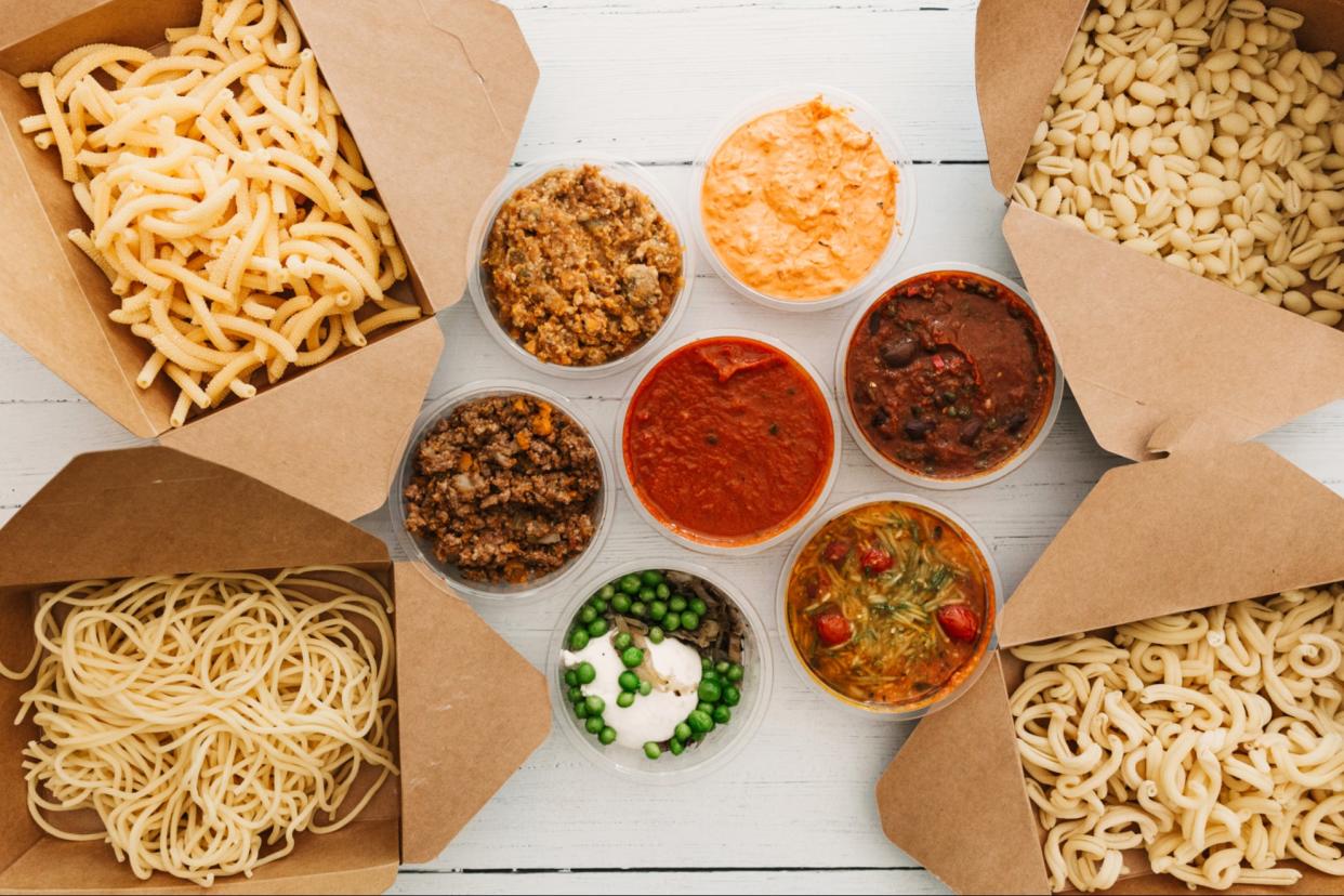 <p>Stylishly presented: Artusi’s attractively put together box is full of pasta and  neatly labelled sauce pots</p> (Sam Harris)