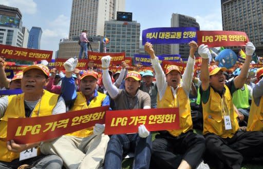 Thousands of South Korean taxi drivers stage a nationwide strike in Seoul on June 20, 2012. More than 200,000 taxi drivers demanded higher fares and cheaper fuel