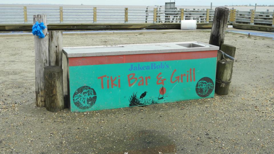 This March 31, 2014 photo shows a metal bar top, all that is left of the Jakeabob's bar and restaurant in Union Beach N.J. After it was destroyed by Superstorm Sandy, owner Gig Liaguno-Dorr moved the business several blocks inland to rented space for 2013, but closed it down for good on March 28 due to a continuing inability to get funds to rebuild it. The reopening of Jakeabob's last year was seen as an inspiration to the still-struggling Raritan Bay community. (AP Photo/Wayne Parry)