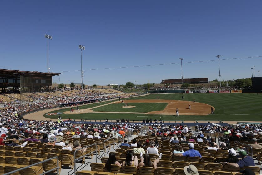 Fans at Camelback Ranch watch a spring training baseball game between the White Sox and Angels in 2016