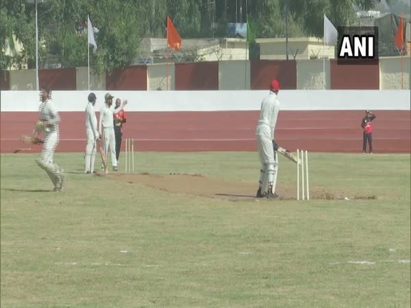 Players playing cricket at the newly-constructed sports stadium in Rajouri