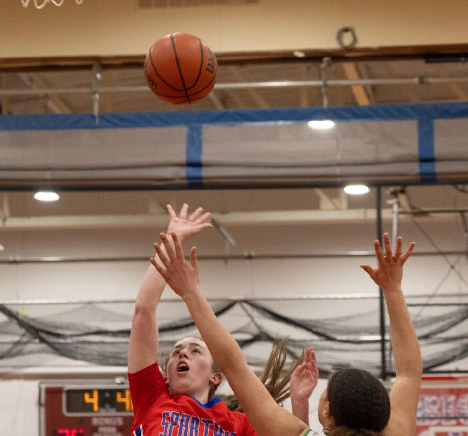 Ocean’s Kayden Clark goes up with a shot as Brick’s AnnaClaire Stuart tries to block her. Ocean Township High School Girls Basketball dominates Brick High School in NJSIAA Central Jersey Group 3 first round game in Ocean Twp. on February 22,, 2024.