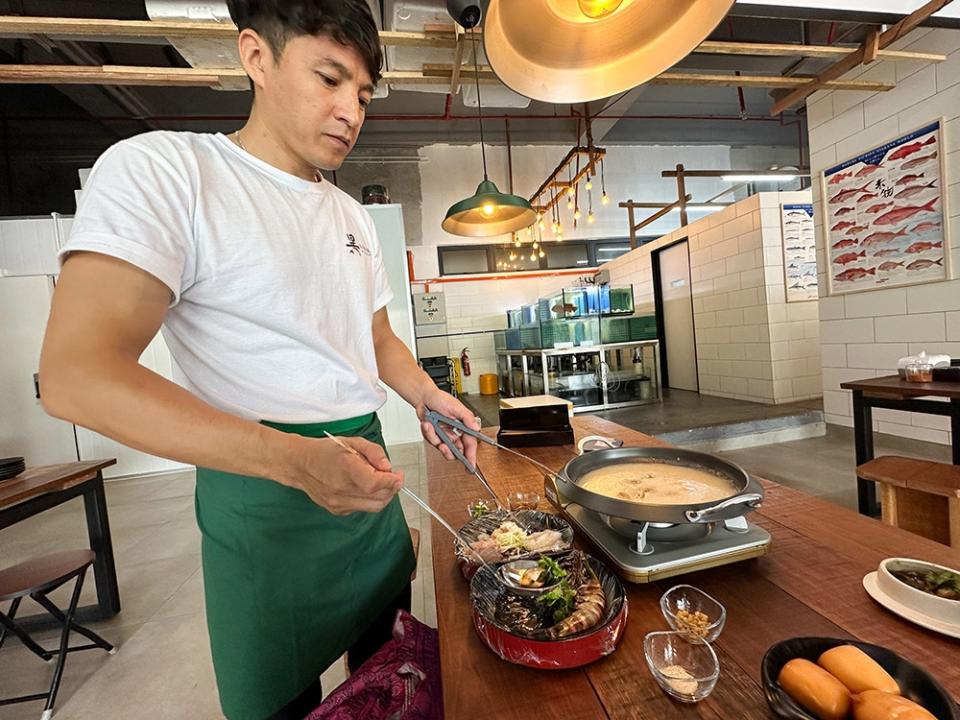 You won't need to lift a finger as they cook the seafood in the porridge.