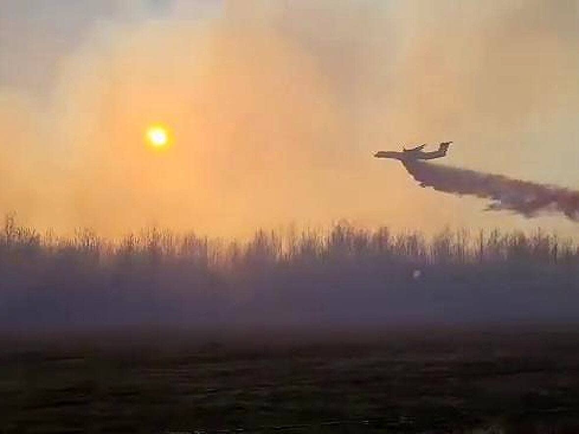 B.C. Wildfire crews battle the Coffee Creek wildfire north of Fort St. John on May 3, 2023. (Fort St. John Fire Department/Facebook - image credit)