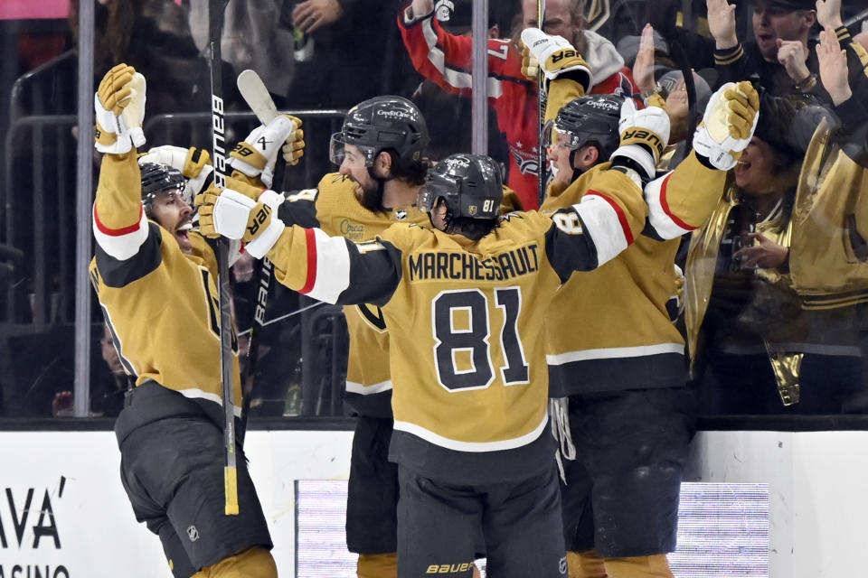 The Vegas Golden Knights celebrate center Jack Eichel's goal against the Dallas Stars during the third period of an NHL hockey game Saturday, Feb. 25, 2023, in Las Vegas. (AP Photo/David Becker)