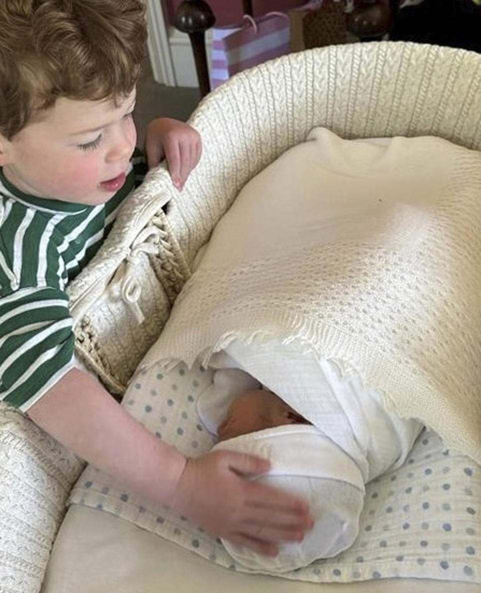 This is an undated photo released by Buckingham Palace on Monday, June 5, 2023 of August Brooksbank touching the head of his brother Ernest George Ronnie Brooksbank. Buckingham Palace says Princess Eugenie has given birth to a baby boy. Eugenie, the niece of King Charles III, and her husband, Jack Brooksbank, welcomed their son, Ernest George Ronnie Brooksbank, on May 30, 2023. The baby, who weighed 7lbs 1oz, is the couple’s second child. The couple’s eldest child, two-year-old August, is now a big brother. (Princess Eugenie/Buckingham Palace via AP)