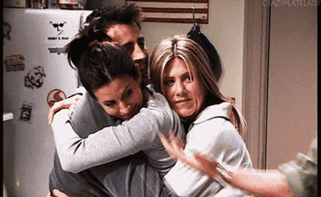 The characters from "Friends" hugging.