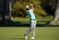 Max Homa hits his second shot on the 13th hole during the final round of the Genesis Invitational golf tournament at Riviera Country Club, Sunday, Feb. 21, 2021, in the Pacific Palisades area of Los Angeles. (AP Photo/Ryan Kang)