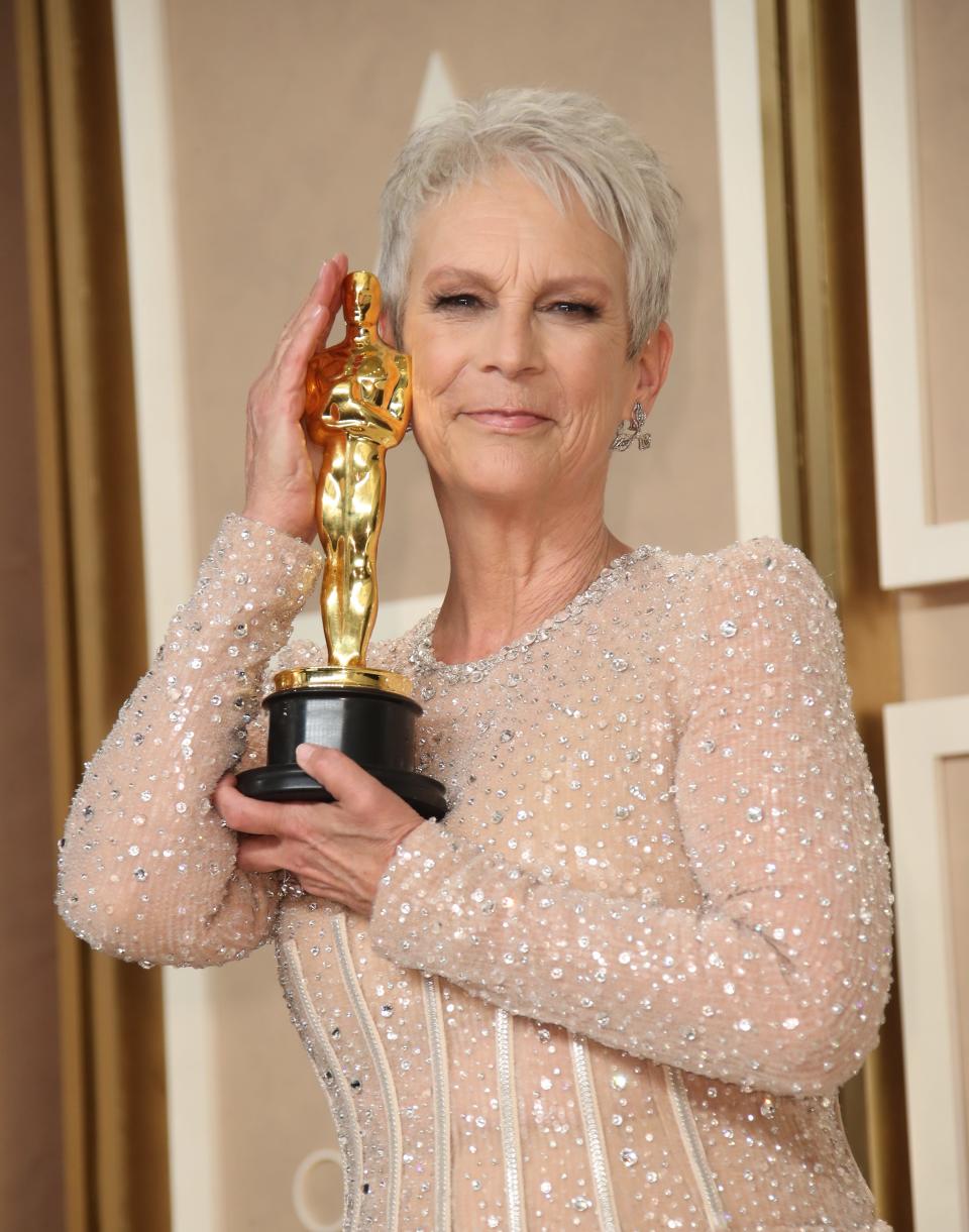 Jamie Lee Curtis poses with her Oscar at the 95th Academy Awards in Los Angeles in March.