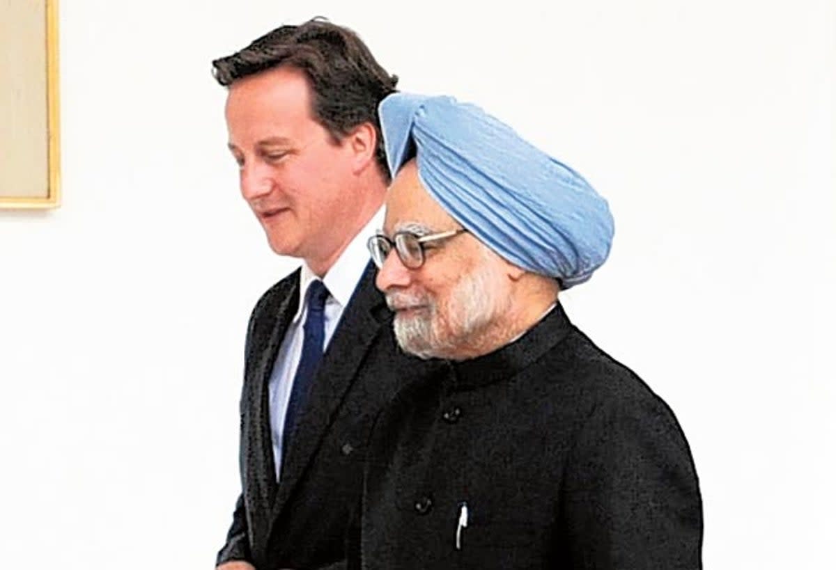 File photo from 2020 shows Manmohan Singh with his then British counterpart David Cameron (PA)