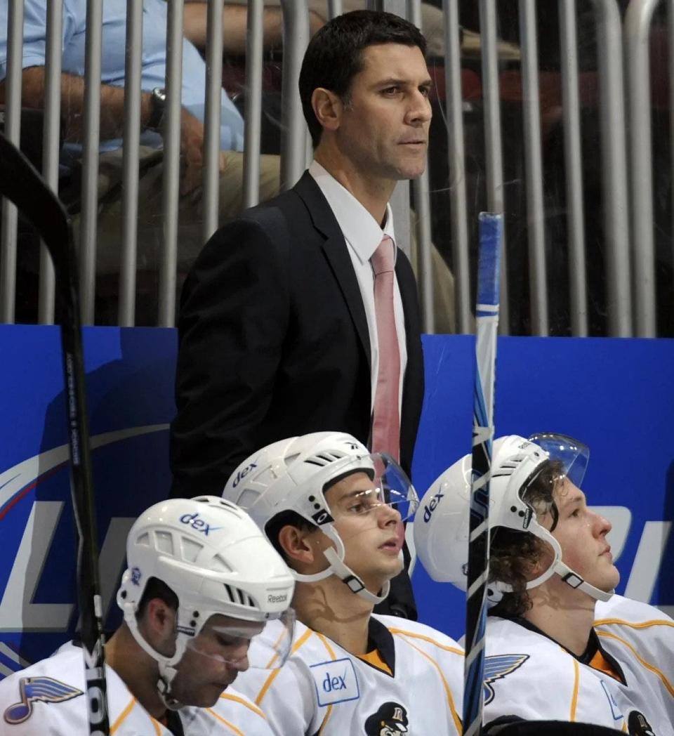 Coach Jared Bednar is shown behind the Peoria Rivermen bench in this 2011 photo. Bednar led the Colorado Avalanche to the 2022 Stanley Cup.