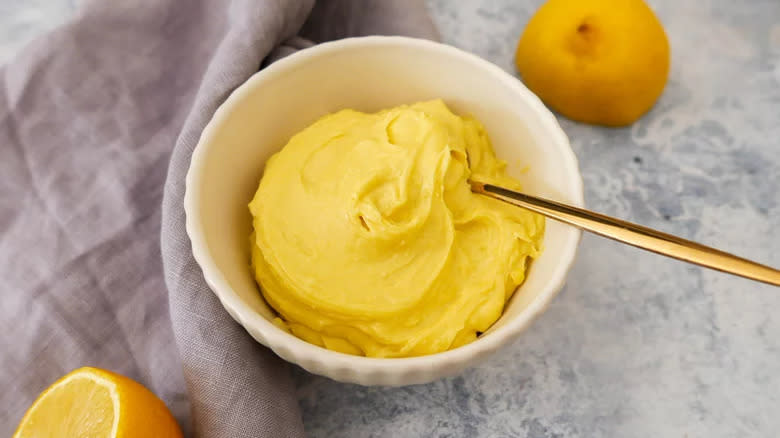 Aioli in ramekin with lemons