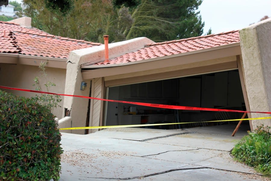 A house in Rolling Hills Estates is severely damaged after a landslide on the Palos Verdes Peninsula in Los Angeles County early July 9, 2023. (Michael Hixon/The Orange County Register via AP)