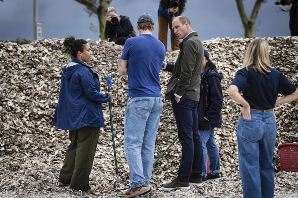 Britain's Prince William, Prince of Wales speaks to students from the Urban Assembly New York Harbor School about the Billion Oyster Project on Governors Island in New York on Monday, Sept. 18, 2023. (AP Photo/Stefan Jeremiah, Pool)