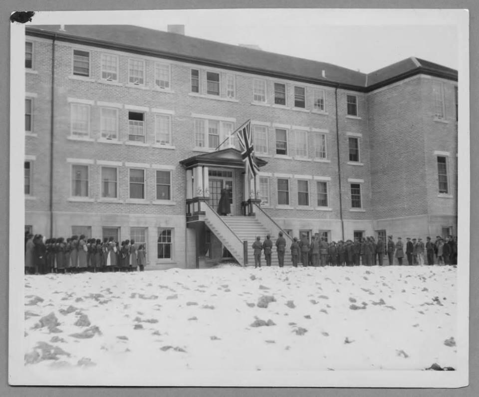 Children line up outside Lejac Residential School, which was located about 140 kilometres west of Prince George, B.C.. (National Centre for Truth and Reconcilation - image credit)