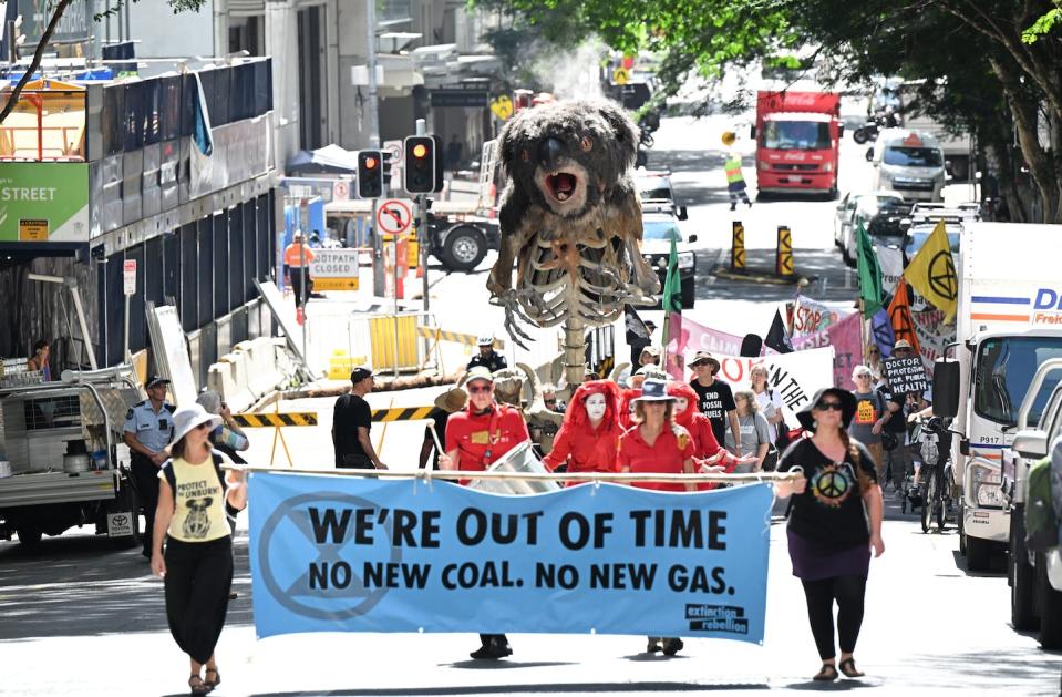 No matter where in the world Australian fossil fuels are burned, the emissions will harm our nation’s wildlife (including endangered koalas), people and properties. <a href="https://photos.aap.com.au/" rel="nofollow noopener" target="_blank" data-ylk="slk:DARREN ENGLAND/AAP;elm:context_link;itc:0;sec:content-canvas" class="link ">DARREN ENGLAND/AAP</a>