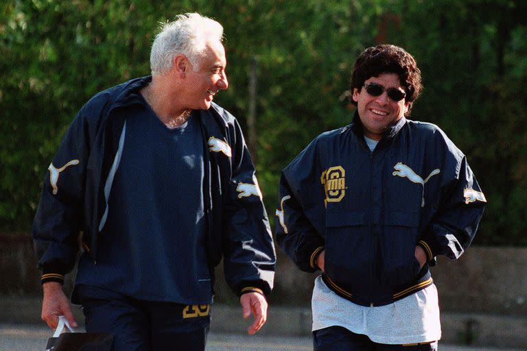 Guillermo Coppola y Diego Maradona en 1996