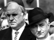 <p>Helmut Kohl stands with former West German President Richard von Weizsaecker (R) in this April 21 1985 file photo during a memorial ceremony marking the 40th anniversary of the liberation of the former Bergen Belsen concentration camp, April 21, 1985. (Ulli Michel/Reuters) </p>