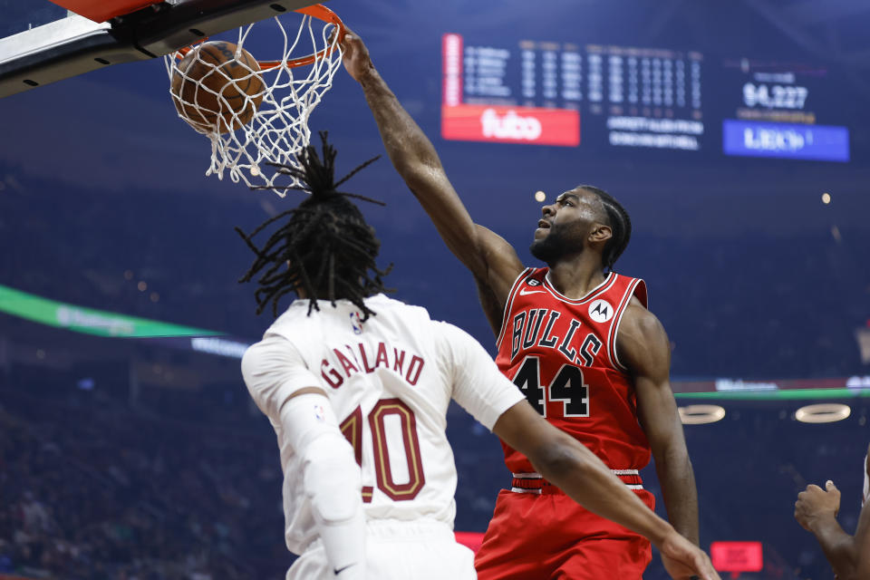 Chicago Bulls forward Patrick Williams (44) dunks against Cleveland Cavaliers guard Darius Garland (10) during the first half of an NBA basketball game, Saturday, Feb. 11, 2023, in Cleveland. (AP Photo/Ron Schwane)