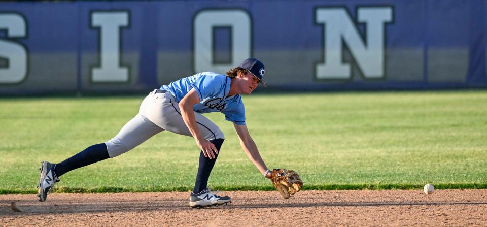Central Valley Christian's Caden Ritchie chases a hit ball against Mission Oak in a Central Section Division III high school baseball game on Wednesday, May 17, 2023. 