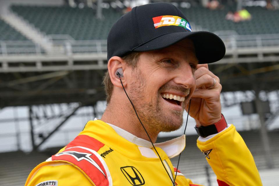 Andretti Autosport driver Romain Grosjean (28) puts in his hearing protection Saturday, May 21, 2022, during the first day of qualifying for the 106th running of the Indianapolis 500 at Indianapolis Motor Speedway