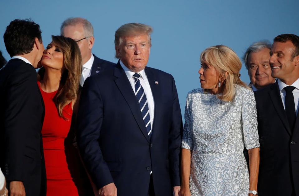 <div class="inline-image__caption"><p>First Lady Melania Trump kisses Canada's Prime Minister Justin Trudeau next to the U.S. President Donald Trump, Brigitte Macron, wife of French President Emmanuel Macron, and French President Emmanuel Macron during the family photo with invited guests at the G7 summit in Biarritz, France, August 25, 2019.</p></div> <div class="inline-image__credit">CARLOS BARRIA</div>