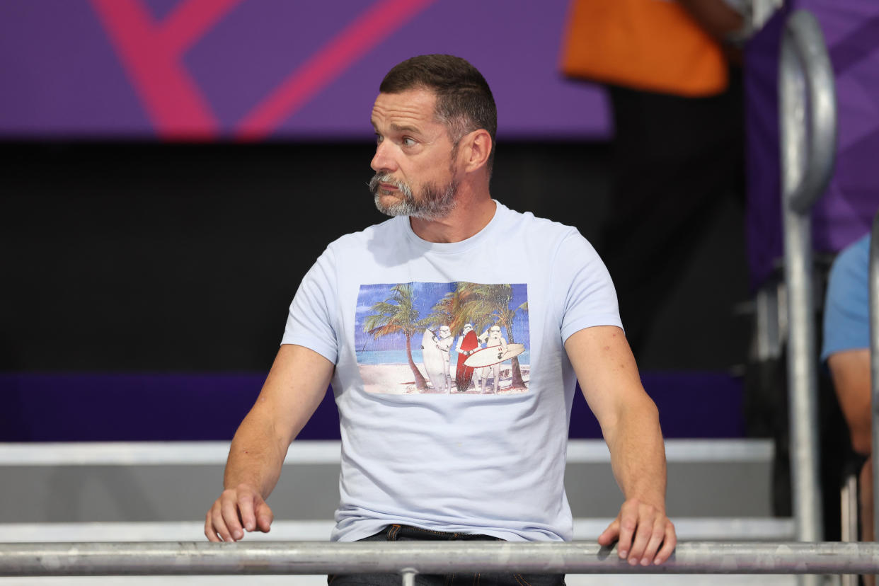 SMETHWICK, ENGLAND - AUGUST 04: Fred Sirieix looks on as his daughter Andrea competes during the Women's 10m Platform on day seven of the Birmingham 2022 Commonwealth Games at Sandwell Aquatics Centre on August 04, 2022 in Smethwick, England. (Photo by Ian MacNicol/Getty Images)