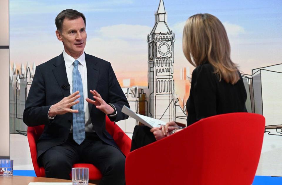 Jeremy Hunt said the government hopes to make 'progress' on cutting national insurance (Jeff Overs/BBC/PA Wire)