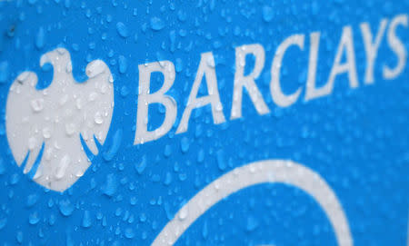 Raindrops are seen on the logo of a rental bicycle sponsored by Barclays in London May 8, 2014. REUTERS/Stefan Wermuth