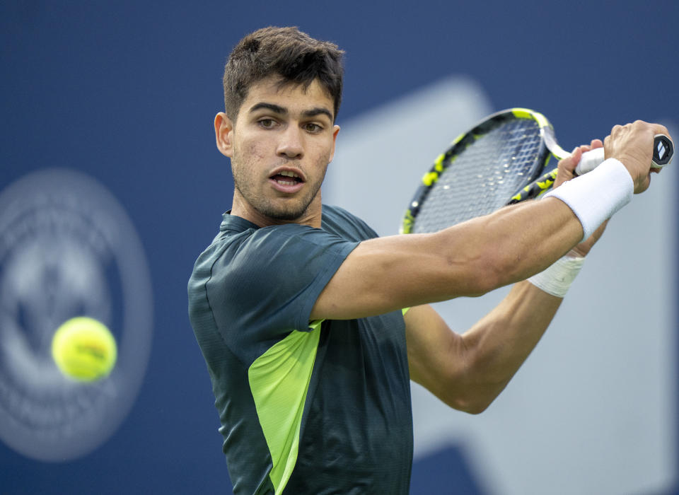 Carlos Alcaraz, of Spain hits a return to Tommy Paul, of the United States, during the National Bank Open men’s tennis tournament Friday, Aug. 11, 2023, in Toronto. (Frank Gunn/The Canadian Press via AP)