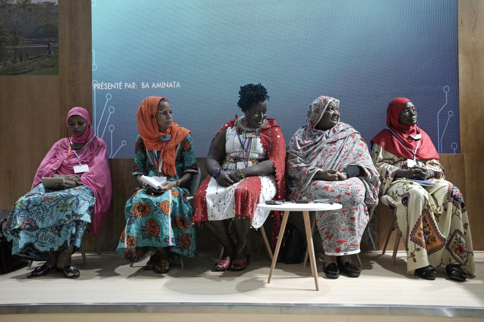 From left, Rakia Amandou, of Niger, Ba Aminata, of Burkina Faso, Rosemary Nenini, Kenya, Fatima Mustafa Ahmed, Sudan, Djeneb Dicko, Burkina Faso, attend a session at the Indigenous Peoples Pavilion at the COP27 U.N. Climate Summit, Tuesday, Nov. 15, 2022, in Sharm el-Sheikh, Egypt. (AP Photo/Nariman El-Mofty)