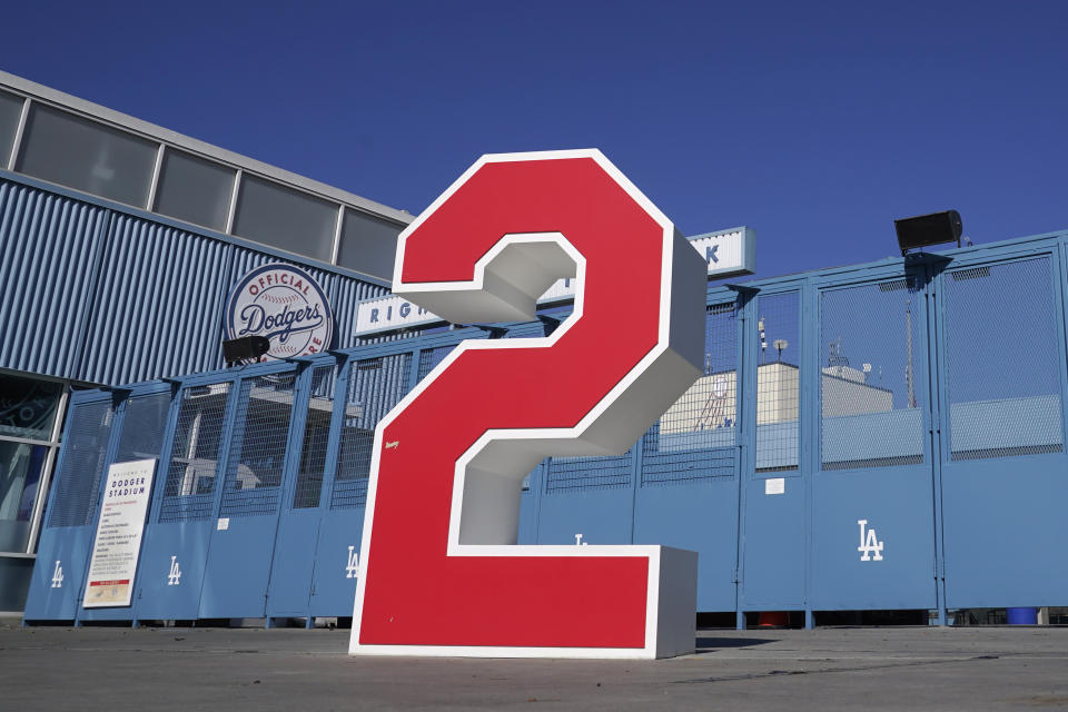 The retired number 2, in honor of former Los Angeles Dodgers manager Tommy Lasorda, is shown at the Retired Numbers Plaza at Dodger Stadium Friday, Jan. 8, 2021, in Los Angeles. Tommy Lasorda, the fiery Hall of Fame manager who guided the Los Angeles Dodgers to two World Series titles and later became an ambassador for the sport he loved during his 71 years with the franchise, has died. He was 93. (AP Photo/Marcio Jose Sanchez)