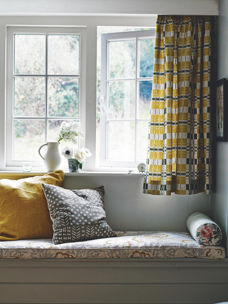 <p> The thick walls of many older country properties create a natural inset at the window, creating the perfect spot to build in seating. </p> <p> A built-in window seat will create a seamless look and gives the opportunity to add storage beneath a lift-up lid. Add a made-to-measure seat pad for comfort. </p> <p> If you don&apos;t want to add a built-in window seat, you can use an ottoman or blanket box to fill the space to create a similar effect. <a href="https://www.homesandgardens.com/ideas/window-seat-ideas" rel="nofollow noopener" target="_blank" data-ylk="slk:Window seat ideas" class="link ">Window seat ideas</a>&#xA0;has tips from interior designers on how to make the most of this feature in your country-style home.&#xA0; </p>